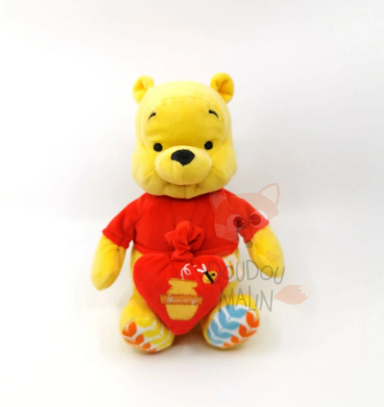 Disney - Winnie L'ourson - Peluche Musicale Coeur Rouge Jaune 25 Cm 3 Disney - Winnie L'ourson - Peluche Musicale Coeur Rouge Jaune 25 Cm